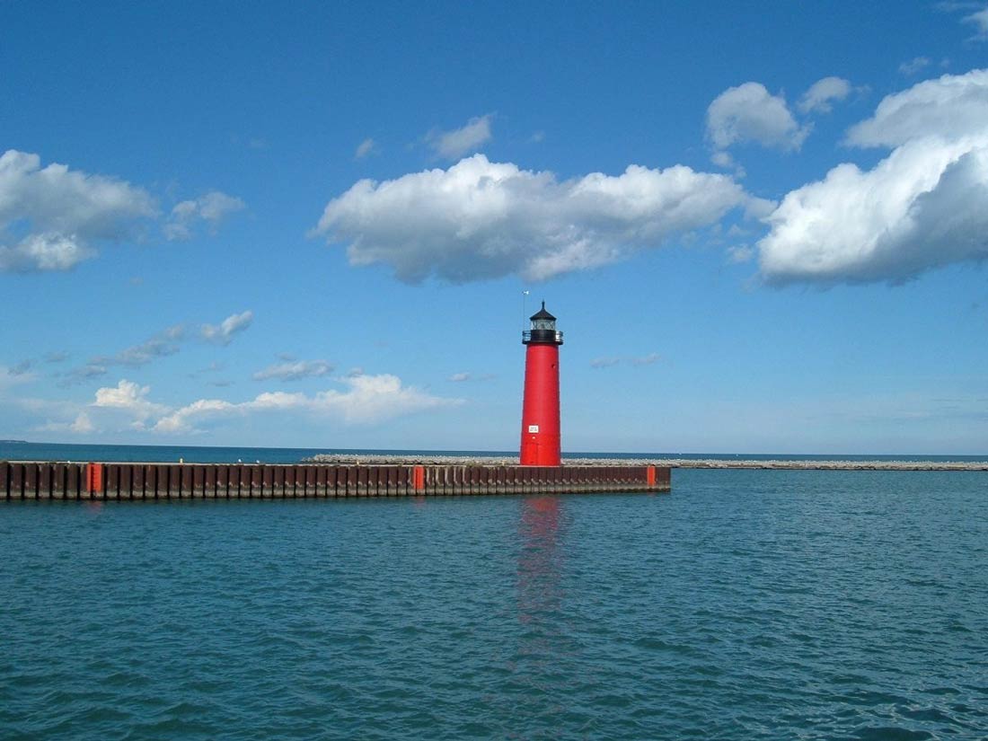 A red light house at the end of a pier - Keep pests away from your property with Terminix Wil-Kil